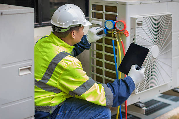 Professional Ac Installation technician working in State Center, IA
